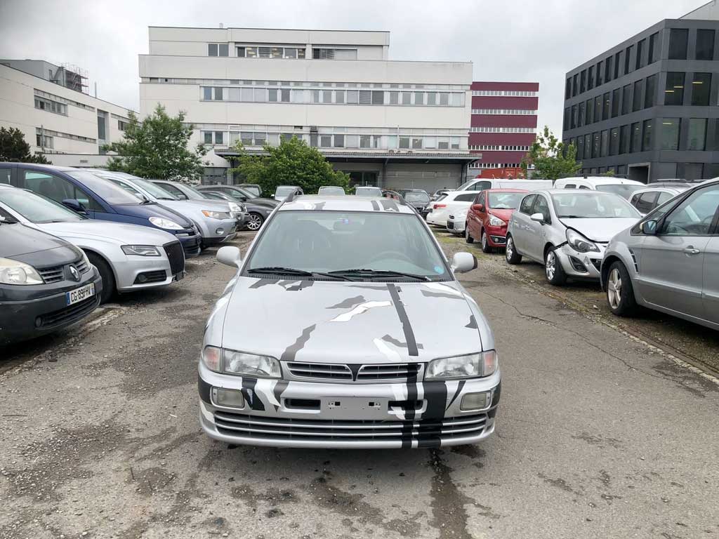 MITSUBISHI Lancer 1.6 GL SwissStar 2001 Benziner Kombi manuell Autoankauf Export Front